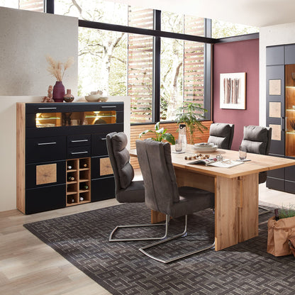 Stella Trading SONATE Barschrank, modernes Highboard in Eiche Altholz Optik & Schwarz, mit Flaschenregal & LED-Beleuchtung, 120x128x37 cm.